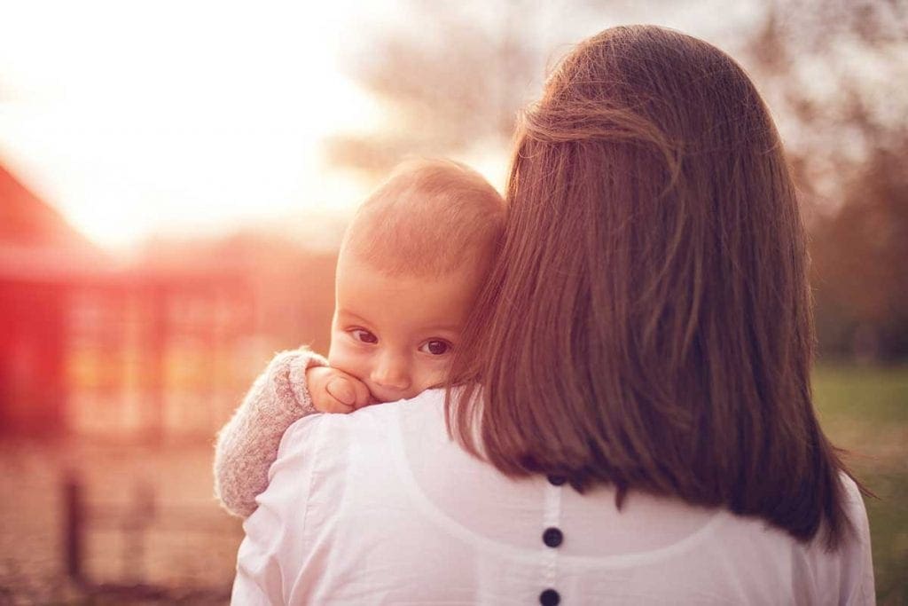 mother holding her baby