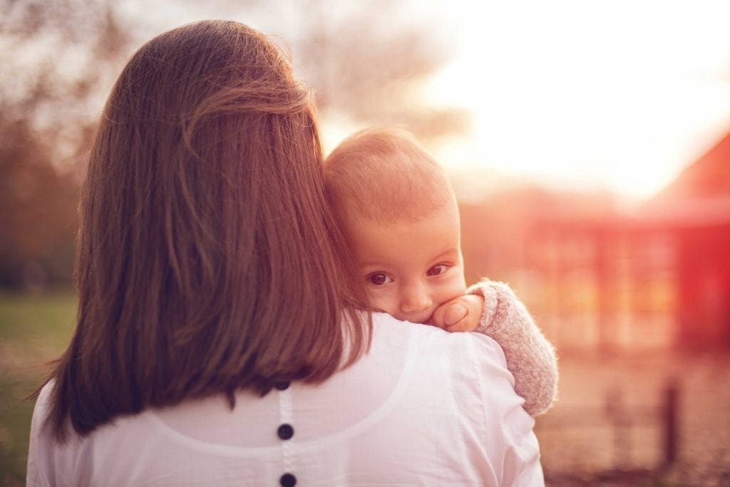 mother holding her baby