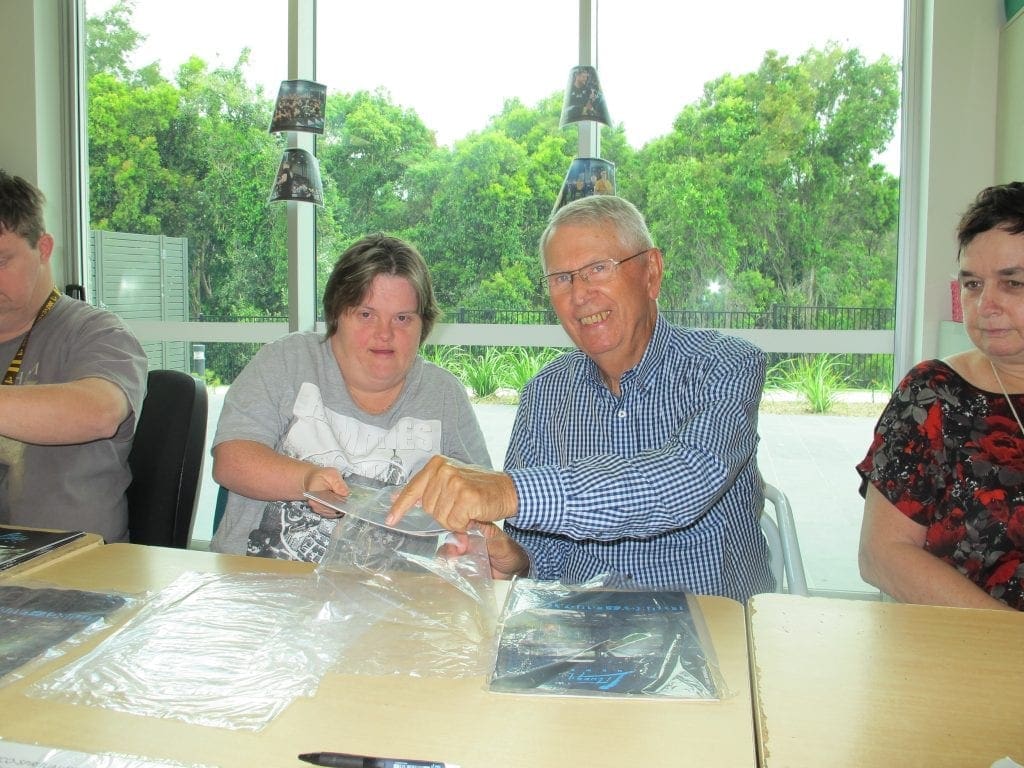 Myhorizon Chairman of the Board Wayne Clarke with Victoria Knight, a Social Enterprises team member and employee working on a packaging contract for a local business